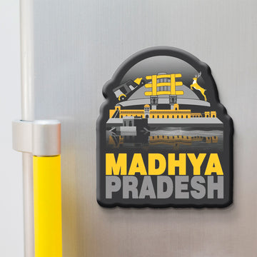 Fridge magnet with 'Madhya Pradesh' text and architectural design on a metallic surface.