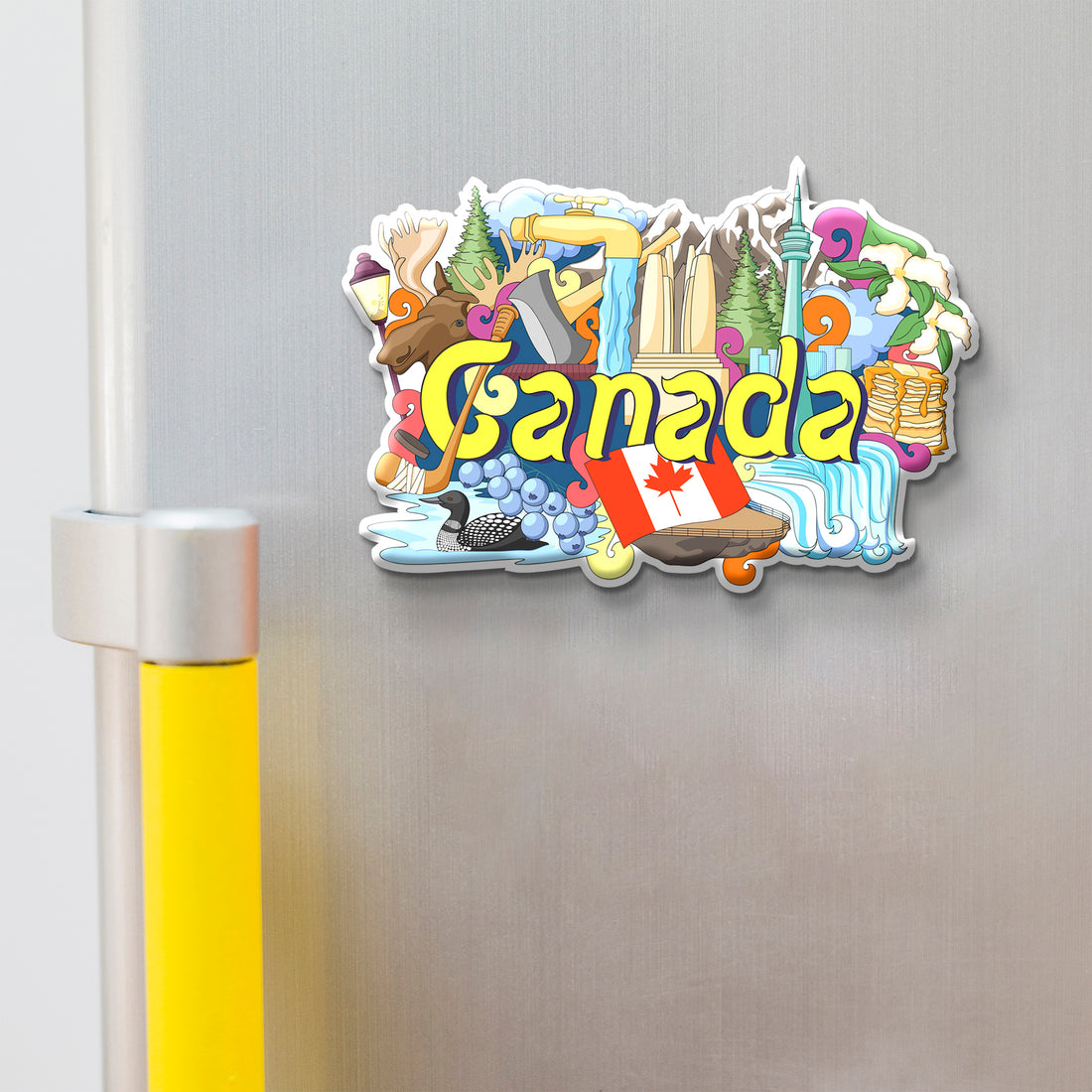 Colorful 'Canada' magnet with various icons on a refrigerator.