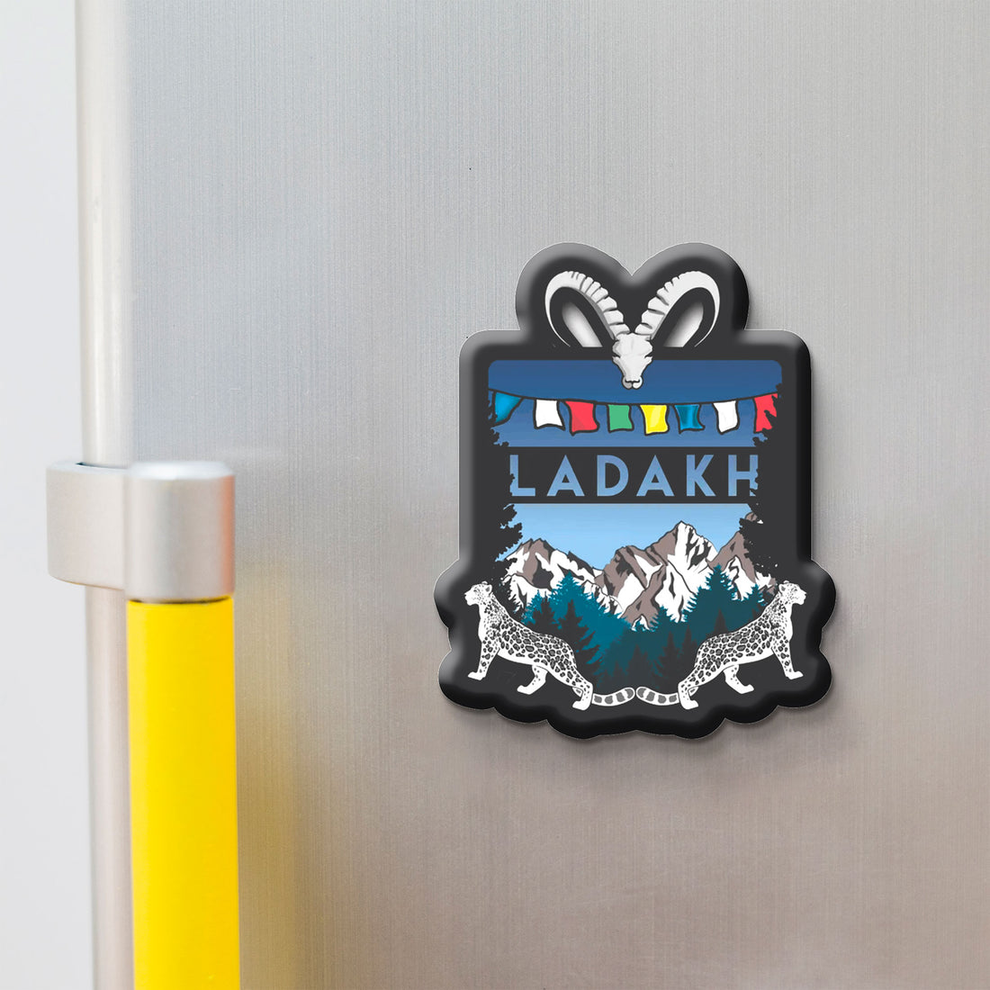 Fridge magnet with 'Ladakh' design on a metallic surface