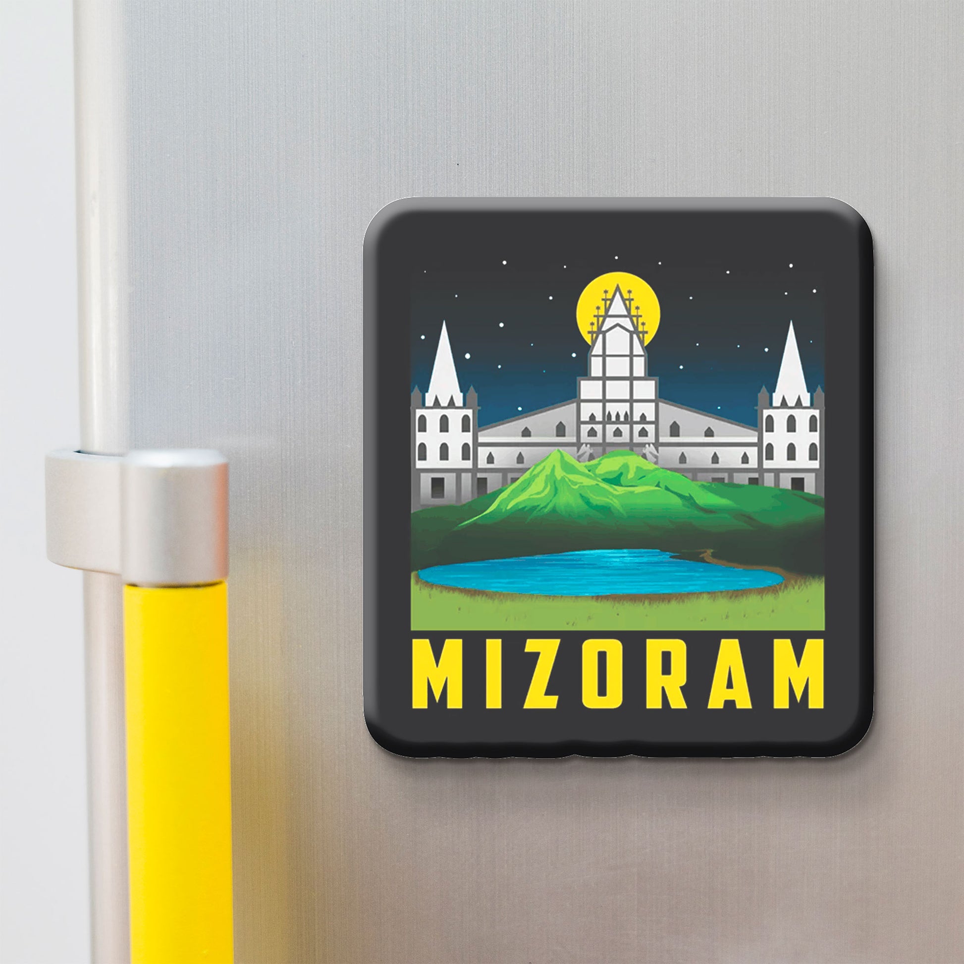 Fridge magnet with a design of Mizo architecture and 'MIZORAM' text on a metallic surface.