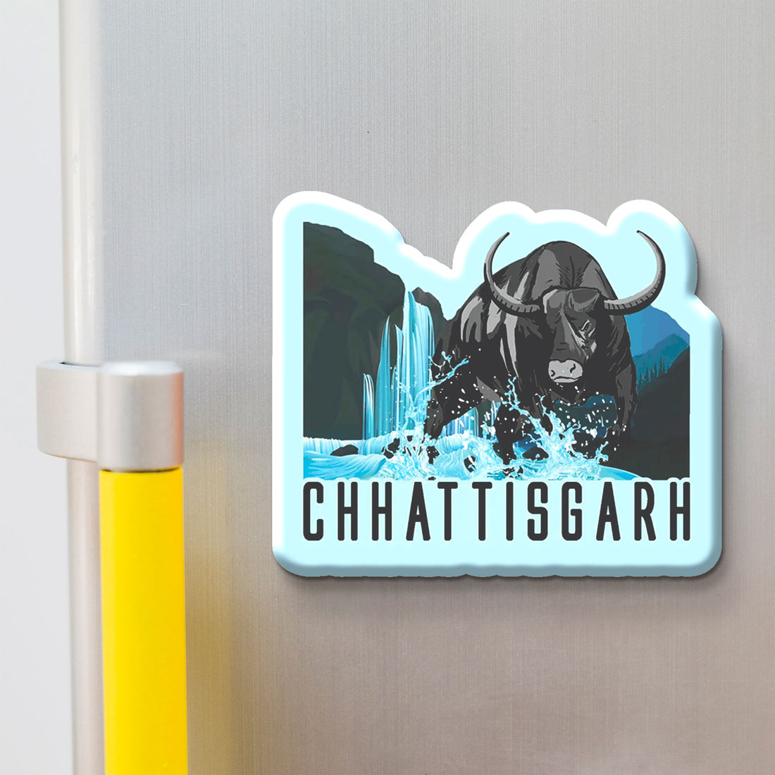 Fridge magnet with a bull design and 'Chhattisgarh' text on a metallic surface.