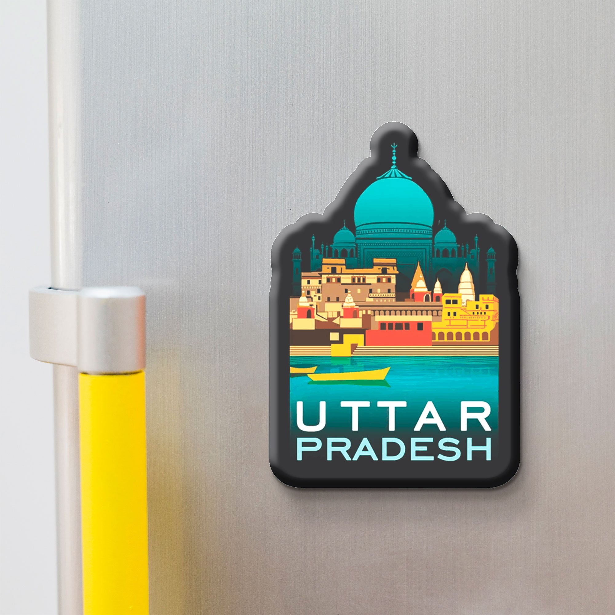 Fridge magnet with a colorful design of a famous landmark and 'Uttar Pradesh' text on a metallic surface.