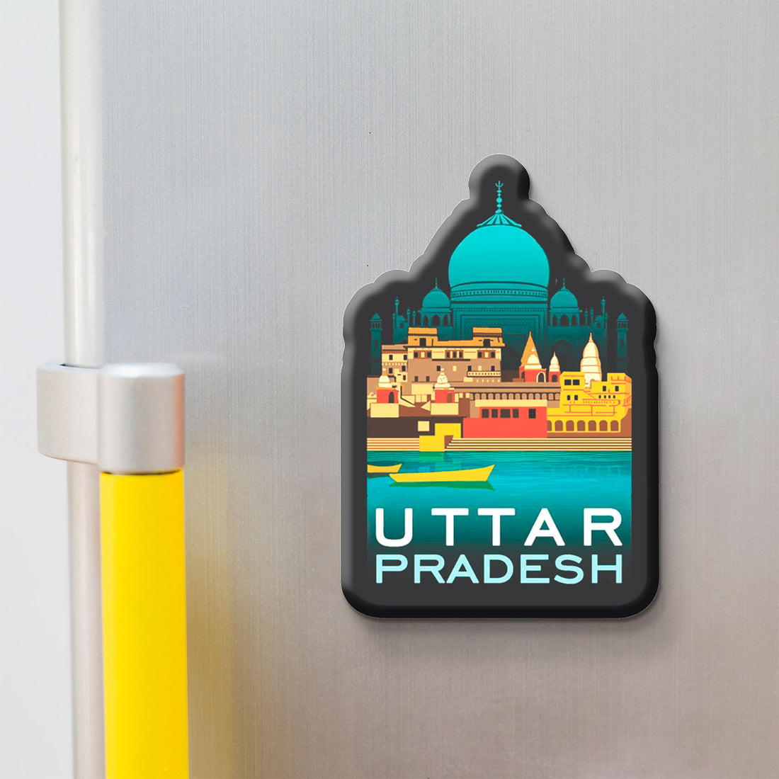 Fridge magnet with a colorful design of a famous landmark and 'Uttar Pradesh' text on a metallic surface.
