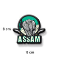 Magnet with a rhinoceros design and 'Assam' text on a white background