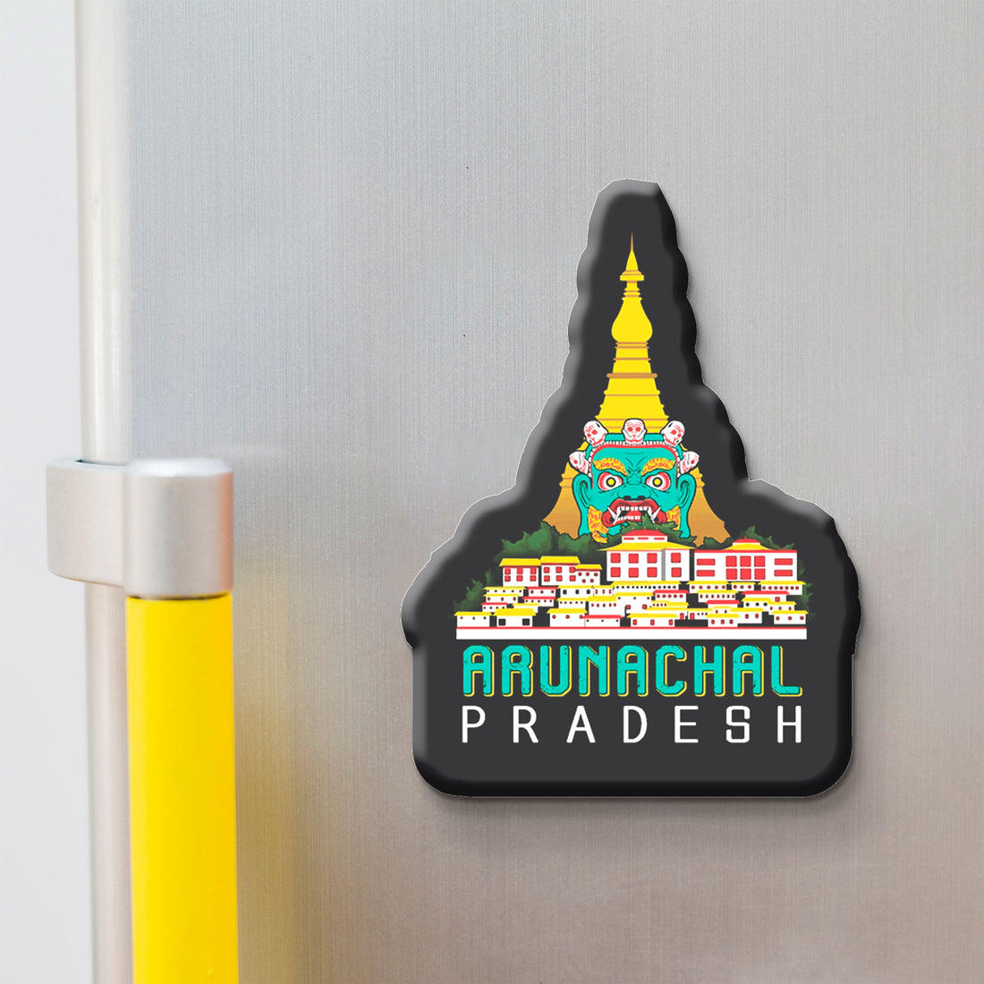 Fridge magnet shaped like Arunachal Pradesh with colorful design on a metallic surface