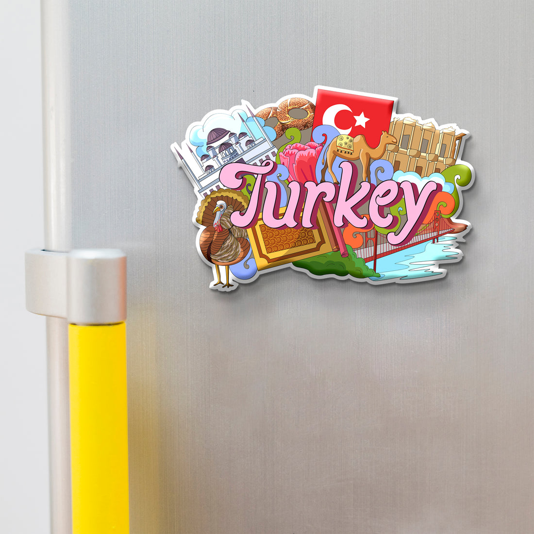 Fridge magnet shaped like Turkey with colorful design on a refrigerator.